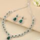 ZAVERI PEARLS Green Dazzling Austrian Diamonds Embellished Contemporary Necklace & Earring Set For Women-ZPFK18201